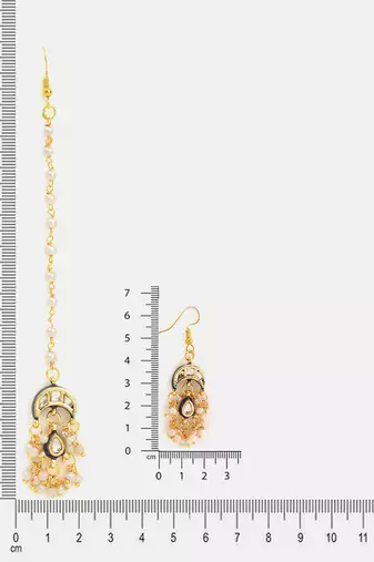 Gold plated kundan blue stone maang tikka with earrings