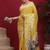 Yellow ethnic motifs banarasi fastive saree