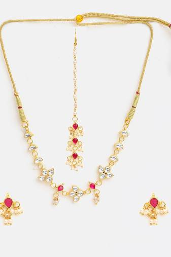 Gold plated kundan pink stone necklace set with maang tikka