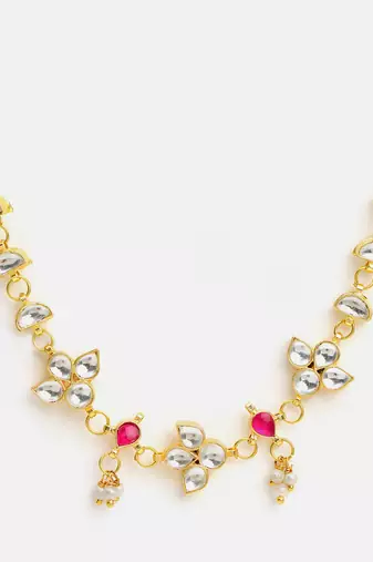 Gold plated kundan pink stone necklace set with maang tikka