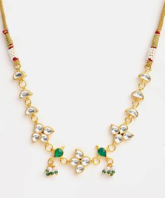 Gold plated kundan green stones necklace set with maang tikka and haathphool 4
