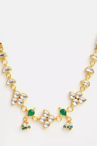 Gold plated kundan green stones necklace set with maang tikka and haathphool