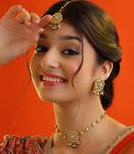 Gold plated kundan green beaded necklace set with maang tikka