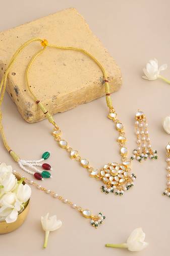 Gold plated kundan green beaded necklace set with maang tikka
