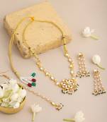 Gold plated kundan green beaded necklace set with maang tikka