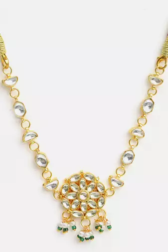 Gold plated kundan green beaded necklace set with maang tikka