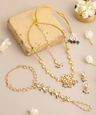 Gold plated kundan green beaded necklace set with maang tikka and haathphool 1