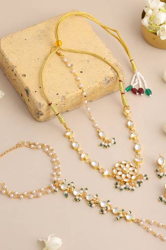 Gold plated kundan green beaded necklace set with maang tikka and haathphool