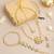 Gold plated kundan green beaded necklace set with maang tikka and haathphool