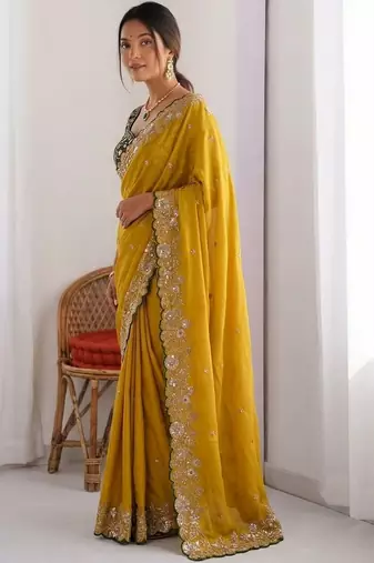 Mustard embroidered sequinned sarees with unstitched blouse piece
