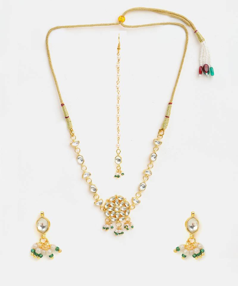Gold plated kundan green beaded necklace set with maang tikka and haathphool