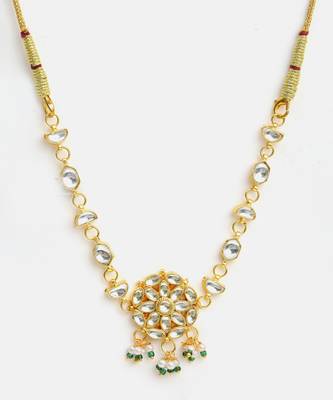 Gold plated kundan green beaded necklace set with maang tikka and haathphool 3