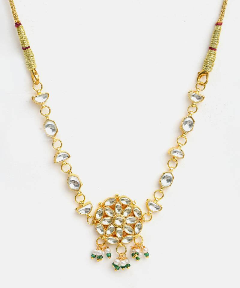 Gold plated kundan green beaded necklace set with maang tikka and haathphool