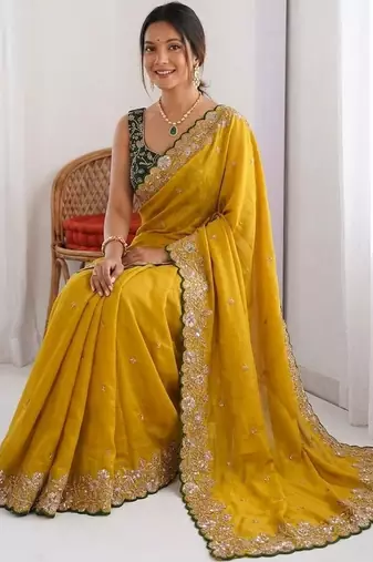 Mustard embroidered sequinned sarees with unstitched blouse piece