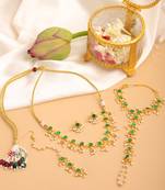 Gold plated kundan green stone necklace set with maang tikka and haathphool