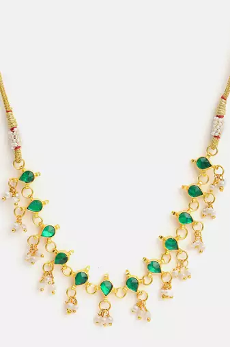 Gold plated kundan green stone necklace set with maang tikka and haathphool