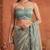 Teal floral embroidered tissue designer saree