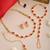 Gold plated kundan red stones necklace set with maang tikka and haathphool