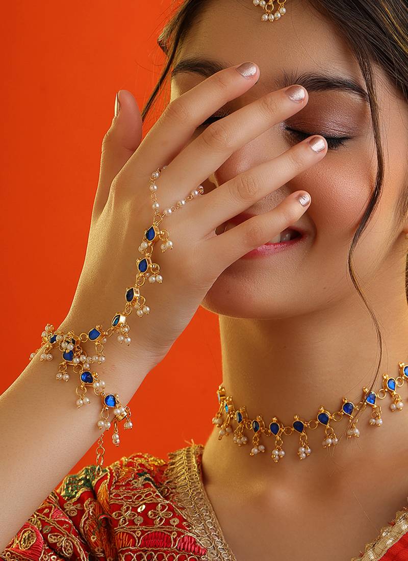 Gold plated kundan blue stones necklace set with maang tikka and haathphool