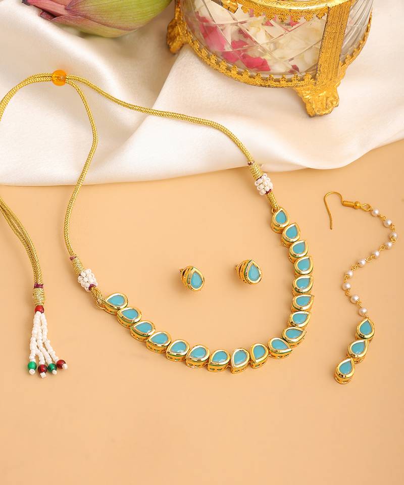 Gold plated kundan turquoise stones necklace set with maang tikka