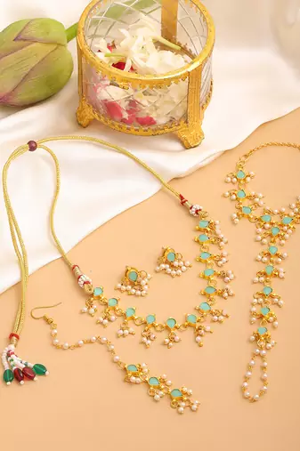 Gold plated kundan mint green stones necklace set with maang tikka and haathphool