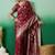 Maroon ethnic motif zari woven kanjeevaram saree with blouse