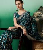 Green ethnic motif zari woven kanjeevaram saree