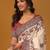 Off white paisley printed banarasi saree with unstitched blouse piece