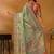 Green paisley printed banarasi saree with unstitched blouse piece