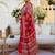 Red women embellished mirror work saree