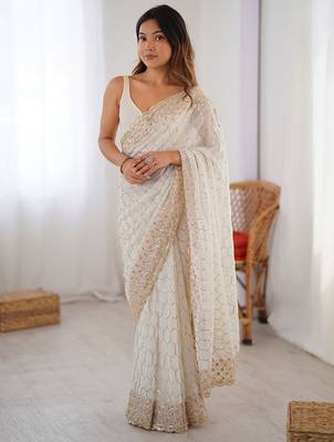 Off white sequinned  georgette embellished party wear saree with matching blouse 1