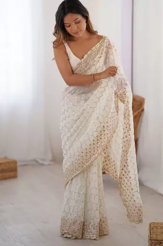 Off white sequinned  georgette embellished party wear saree with matching blouse