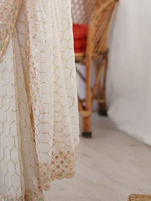 Off white sequinned  georgette embellished party wear saree with matching blouse 5