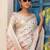 Cream printed ready to wear saree with blouse piece