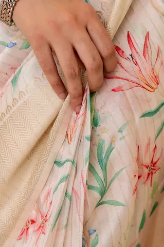 Cream printed ready to wear saree with blouse piece