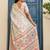 Cream printed ready to wear saree with blouse piece