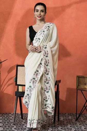 Cream embroidered saree with blouse piece