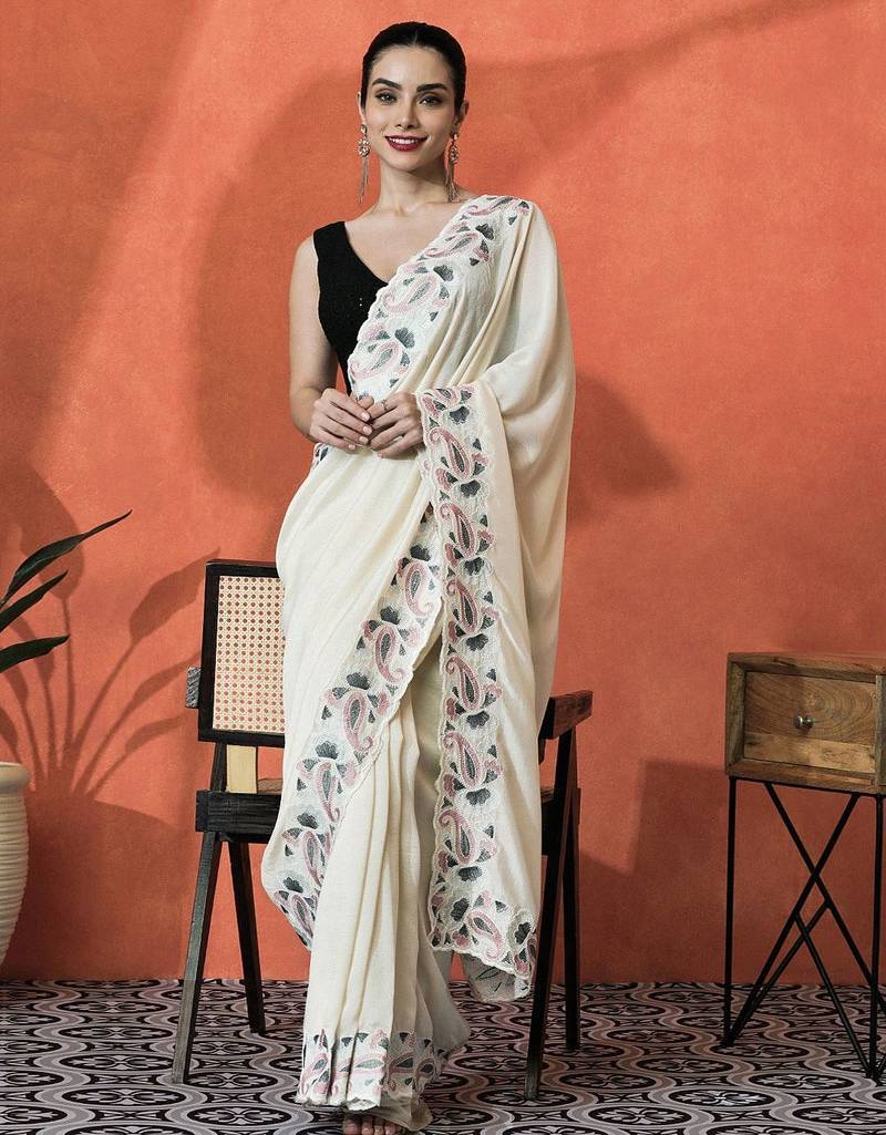 Cream embroidered saree with blouse piece