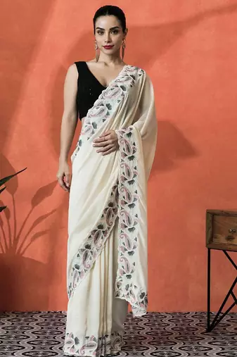 Cream embroidered saree with blouse piece