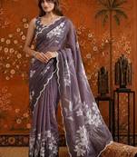 Purple colourblocked mirror work satin saree