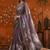 Purple colourblocked mirror work satin saree
