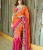 Orange ethnic motifs embroidered satin heavy work saree