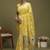 Yellow ethnic motifs banarasi fastive saree