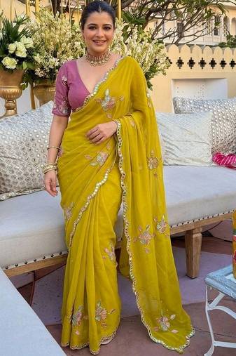 Yellow ethnic motifs  georgette saree