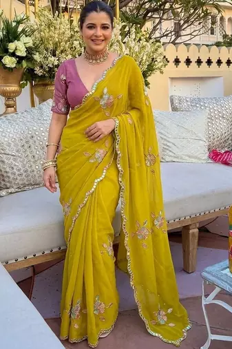 Yellow ethnic motifs  georgette saree