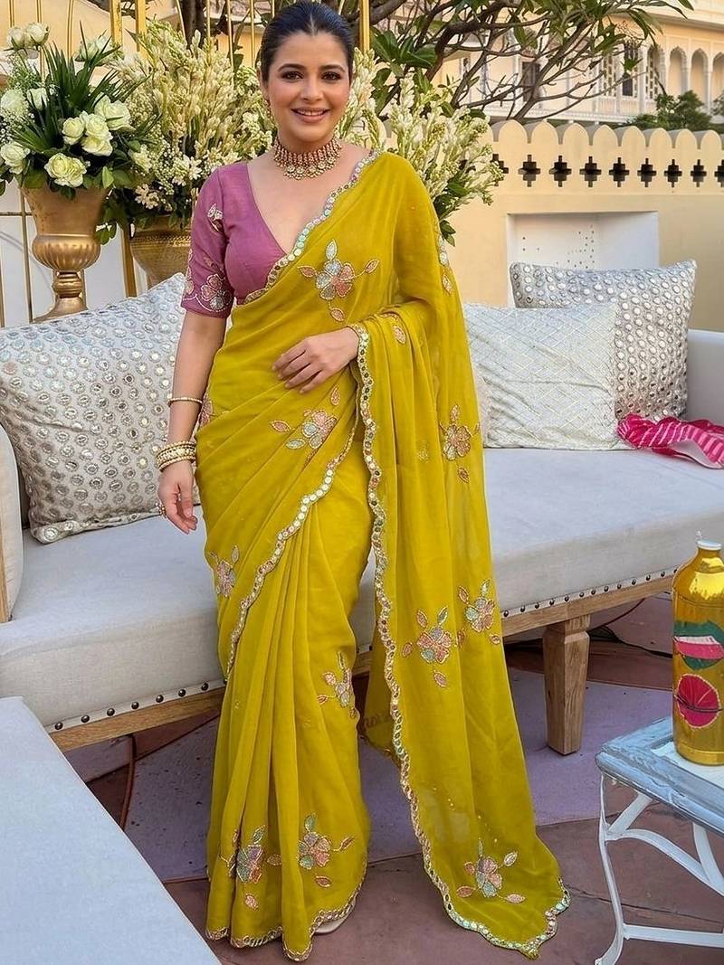 Yellow ethnic motifs  georgette saree