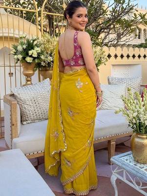 Yellow ethnic motifs  georgette saree 3