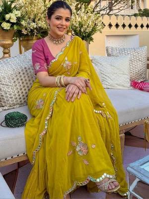 Yellow ethnic motifs  georgette saree 4