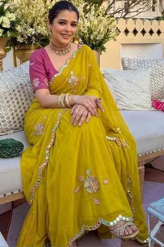 Yellow ethnic motifs  georgette saree