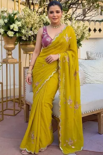 Yellow ethnic motifs  georgette saree